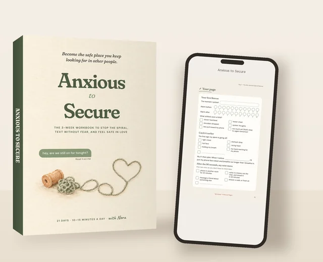 The workbook beside a phone showing Day 1's fill-in page